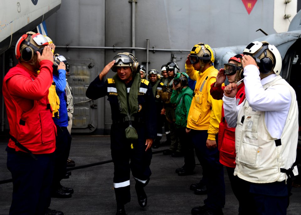 Indian navy Rear Admiral Biswajit Dasgupta, flag officer commanding Eastern Fleet, is rendered sideboy honors as he departs the aircraft carrier USS Nimitz (CVN 68) marking the conclusion of exercise Malabar 2017