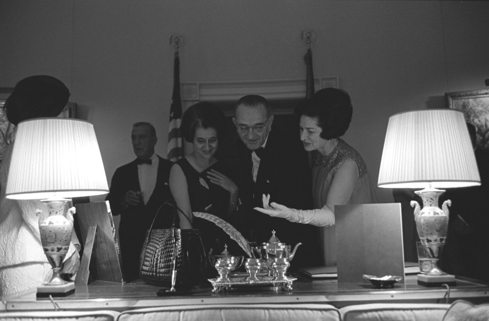 Indira Gandhi and the Johnsons exchange gifts before a state dinner