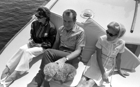 Julie Nixon Eisenhower, President Richard Nixon, and Pat Nixon Sailing with Vicky the Poodle aboard the Nellie near Minot Island, Maine