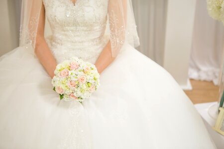 Wedding bouquet priest