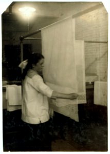 Katherine Flanagan, 15 years old. Examining curtains at Boutwell, Fairclough & Gold, 274 Summer Street Extension. Mr. Fitzgerald, Manager. LOC nclc.05189