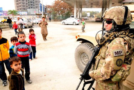 Local soldier mentors Afghan police in Kabul photo