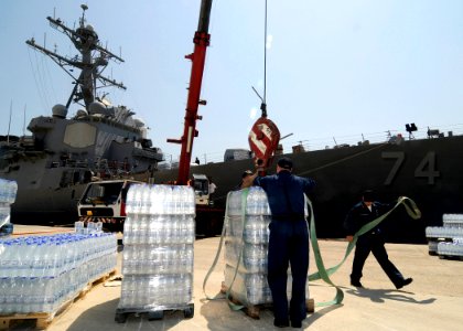 Loading bottled water on the USS McFaul (DDG 74)
