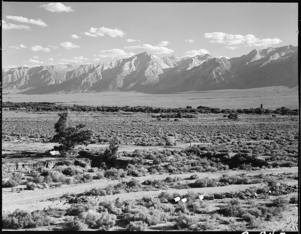 Manzanar Relocation Center, Manzanar, California. A view of surrounding country flanked by beautifu . . . - NARA - 538135