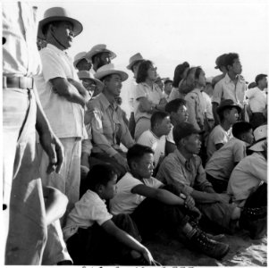 Manzanar Relocation Center, Manzanar, California. Evacuees of Japanese ancestry are enjoying a base . . . - NARA - 538070