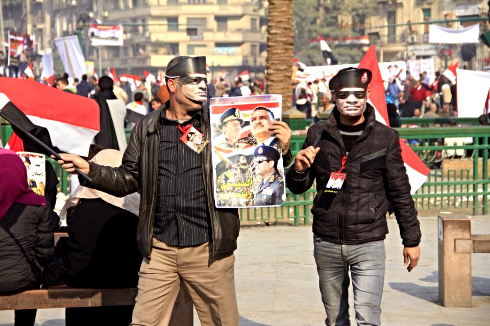 Many in the crowd holding pictures of Abdel Fateh el Sissi