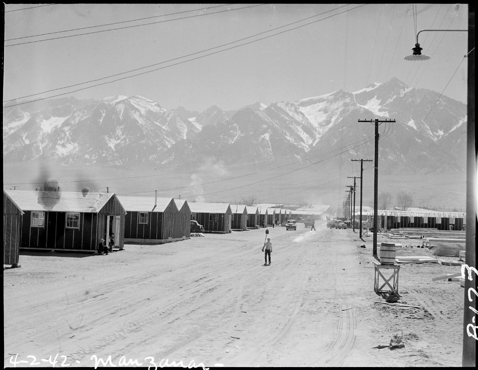Manzanar Relocation Center, Manzanar, California. Street scene and view of quarters for evacuees of . . . - NARA - 536871