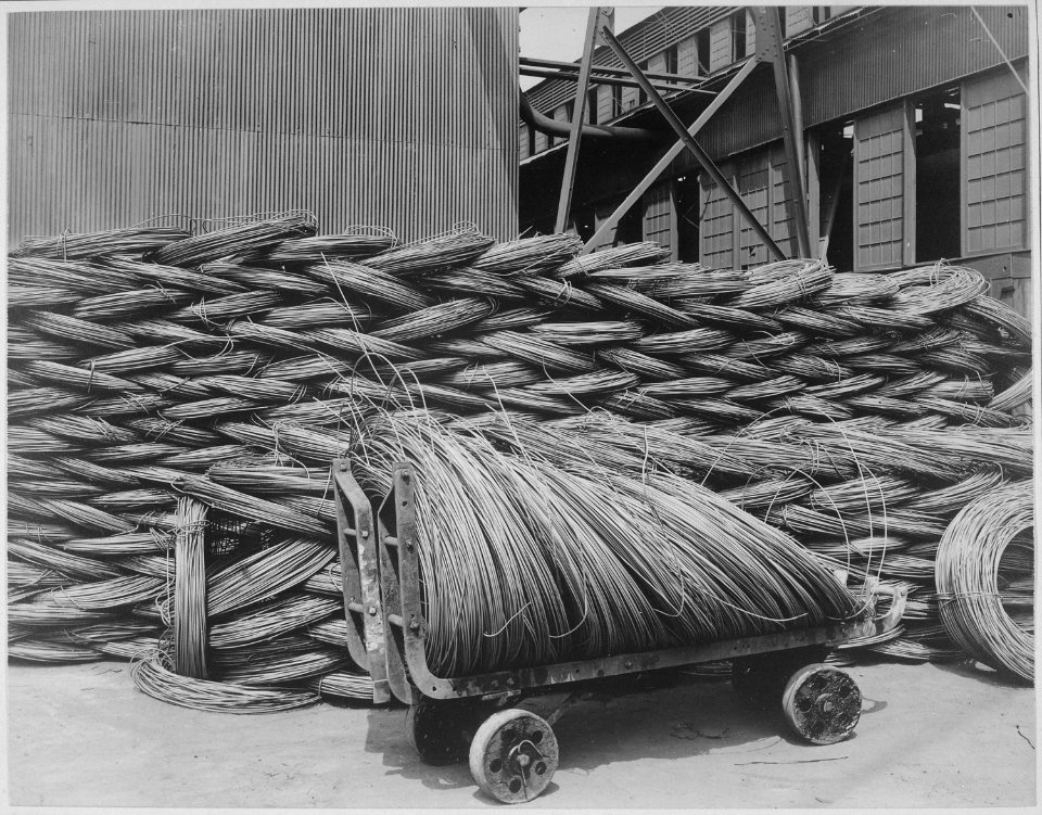 Manufacturing barbed wire. Wire rods. Raw material from which steel wire is drawn. Pittsburg Steel Company, Monessen, Pe - NARA - 533655