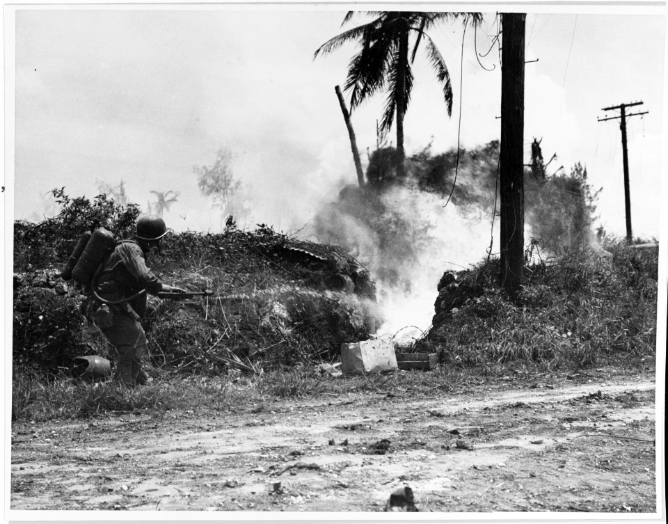 Marine flamethrower near Sumay golf course, Guam, July 1944