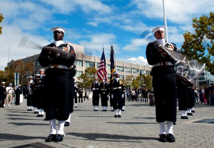 Marines and sailors participate in half-time ceremony during NFL game 121006-N-PB383-678