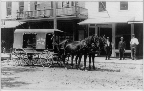 Marion stage, a delivery wagon drawn by two horses in front of post office LCCN2003688469