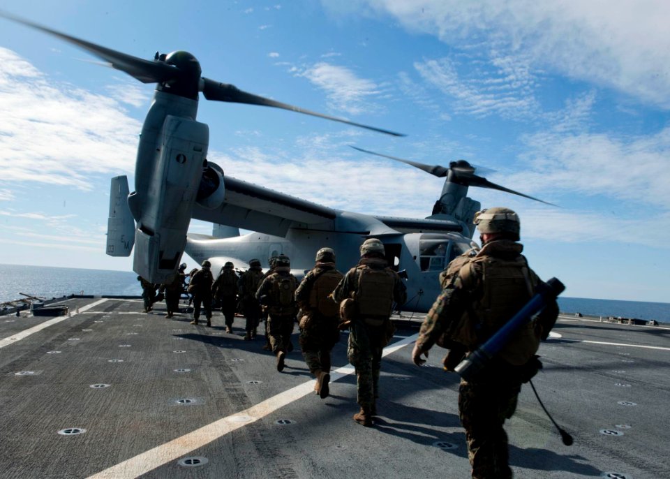 Marines prepare to board an Osprey helicopter. (6807752065)