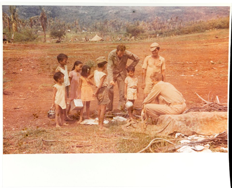 Marines talking to Guam children, August 1944