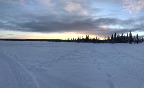 Lapland the frozen lake sunset