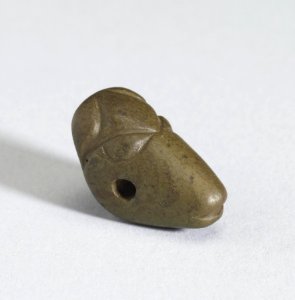 Mesopotamian - Ram's Head Pendant - Walters 421461 - Three Quarter Right photo