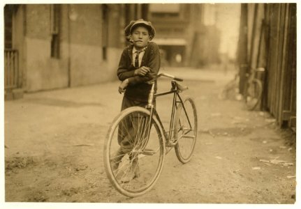 Messenger boy working for Mackay Telegraph Company. Said fifteen years old. Exposed to Red Light dangers. LOC cph.3a01152 photo