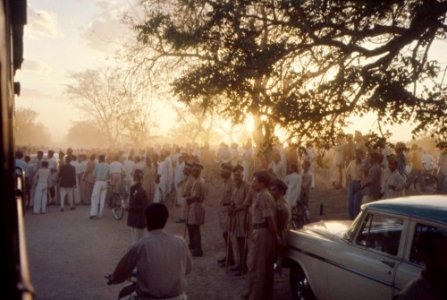 People waiting at an unidentified train station, during First Lady Jacqueline Kennedy’s trip to India
