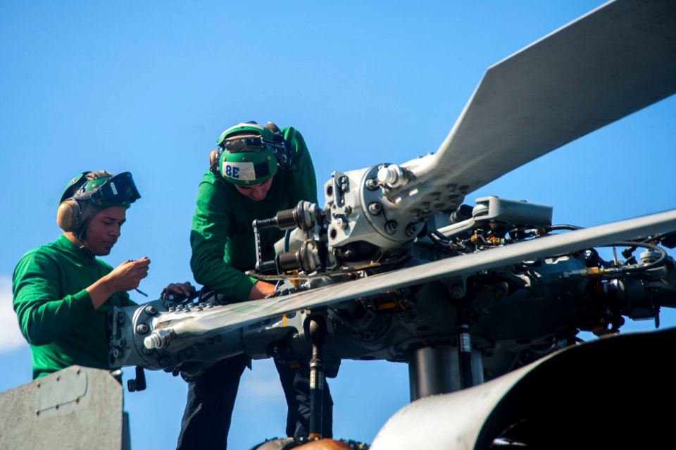Performing maintenance 140414-N-NU281-015