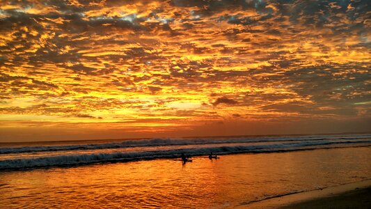Beach sunset surfing