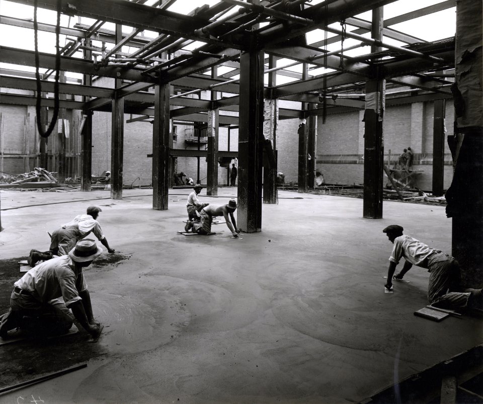 Photograph of Workers Finishing the Floor of a Stack Area in the National Archives Building (35262799153)