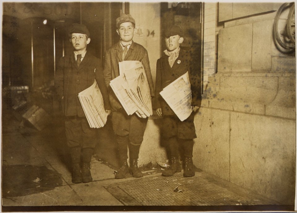 Photograph taken after midnight on April 17, 1912, G St. near 14th. These boys, 10, 11, and 12 years old, were stuck... - NARA - 306616