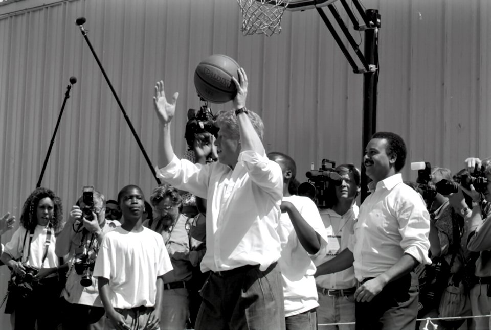 President Bill Clinton plays basketball at The Playground basketball court