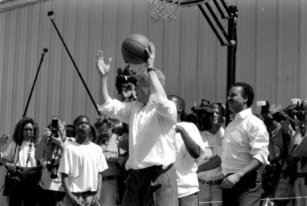 President Bill Clinton plays basketball at The Playground basketball court