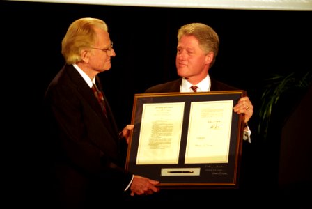 President Bill Clinton Attending A Dinner For Reverend Billy Graham