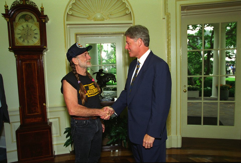 President Bill Clinton greets Willie Nelson
