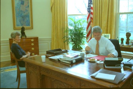 President Bill Clinton talking on the telephone in the Oval Office with President Francois Mitterand of France (01)