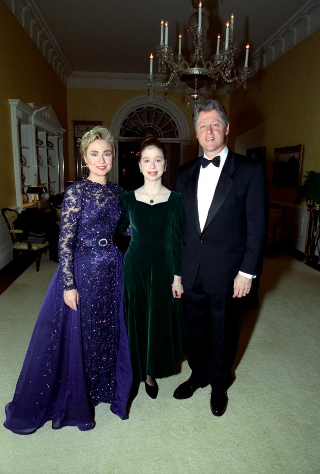 President Bill Clinton, First Lady Hillary Clinton, and Chelsea Clinton pose for a family photograph in the residence