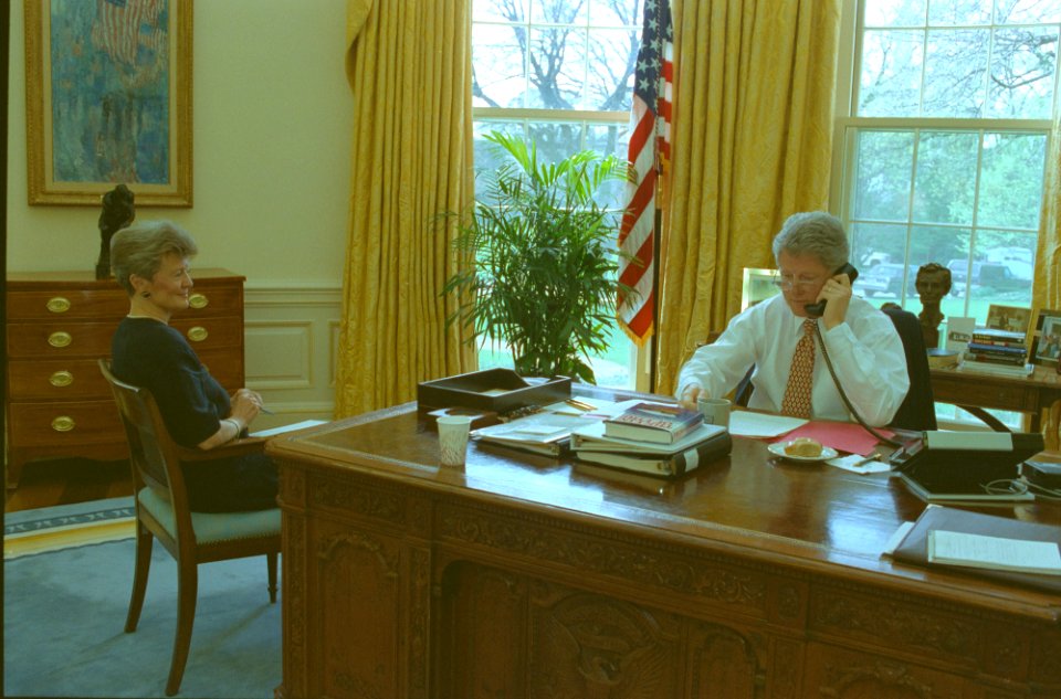 President Bill Clinton talking on the telephone in the Oval Office with President Francois Mitterand of France (05)
