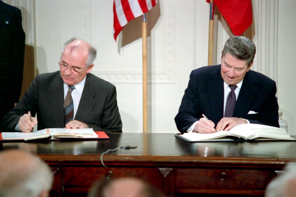 President Ronald Reagan and Soviet General Secretary Mikhail Gorbachev signing the INF Treaty in the East Room