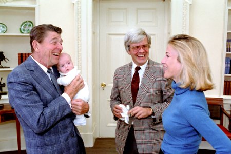 President Ronald Reagan During a Photo Op with Judy Woodruff and Family in The Oval Office NARA 75856513 photo