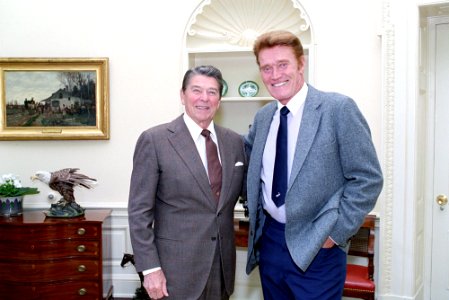 President Ronald Reagan During a Photo Op. with Chuck Connors in The Oval Office photo
