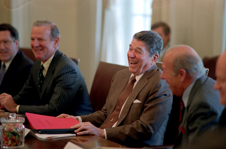 President Ronald Reagan attending an Economic Policy Council Meeting with James Baker and George Shultz in the Cabinet Room