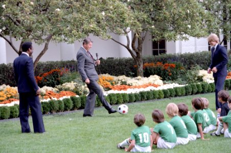 President Ronald Reagan at a soccer demonstration with Pele and Steve Moyers in the Rose Garden photo