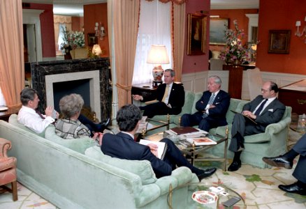 President Ronald Reagan during a trip to New York City for a briefing for a bilateral meeting with Foreign Minister Eduard Shevardnadze of USSR with staff members at the Waldorf Astoria Hotel photo