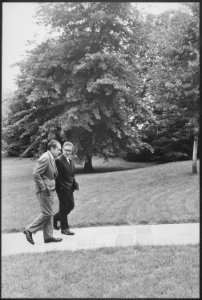 President Nixon walking with Kissinger on south lawn of the White House - NARA - 194731 photo