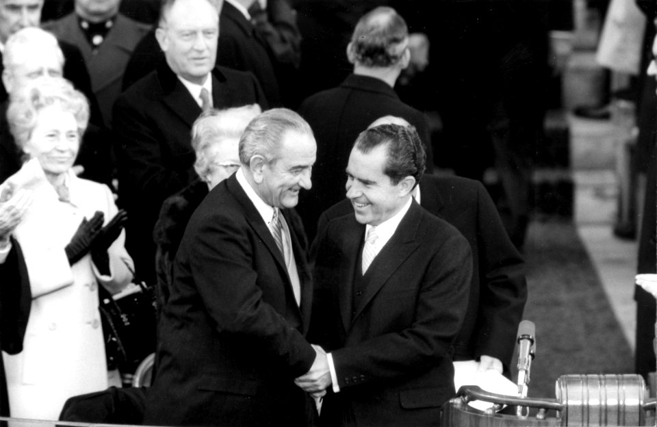 President Richard Nixon Shaking Hands with Former President Lyndon Baines Johnson at the Inaugural Podium