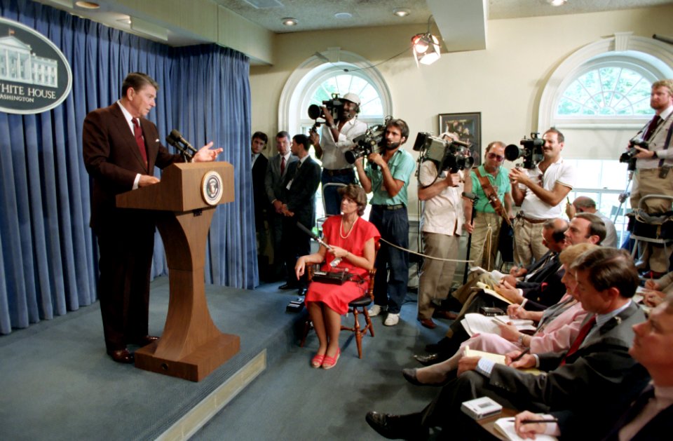 President Ronald Reagan giving a press briefing