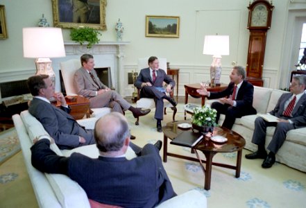 President Ronald Reagan during a meeting in the Oval Office photo