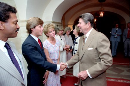 President Ronald Reagan greeting actor Christopher Atkins with Billy Dee Williams and Lisa Hartman