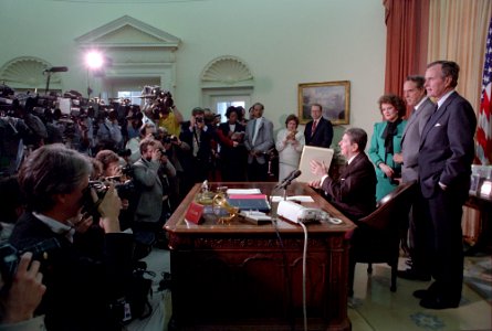 President Ronald Reagan signing the veto of HR 2, the Surface Transportation and Uniform Relocation Assistance Act photo