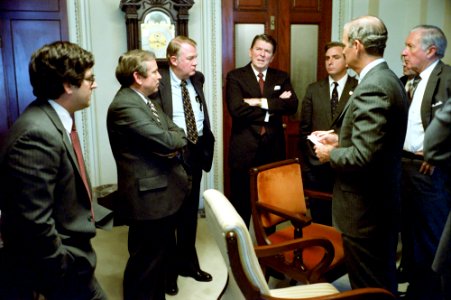 President Ronald Reagan during a budget compromise meeting with bipartisan Congressmen at the United States Capitol