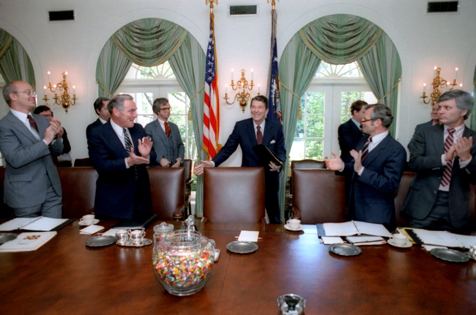President Ronald Reagan attends his first cabinet meeting after the assassination attempt