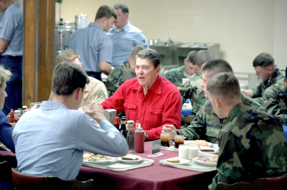 President Ronald Reagan eating lunch with the troops at Camp David