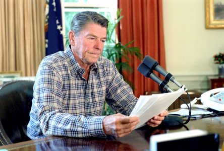 President Ronald Reagan during his Saturday Radio Address in the Oval Office photo