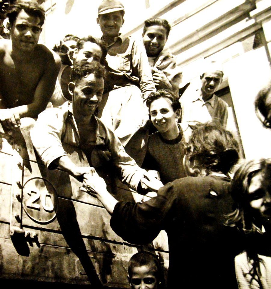 Relatives greet family members released from prison camps, Sicily 1943 (24479567381)