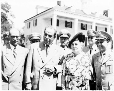 President Romulo Gallegos of Venezuela and his wife visit Mt. Vernon. They are in the center of this group in front... - NARA - 199825
